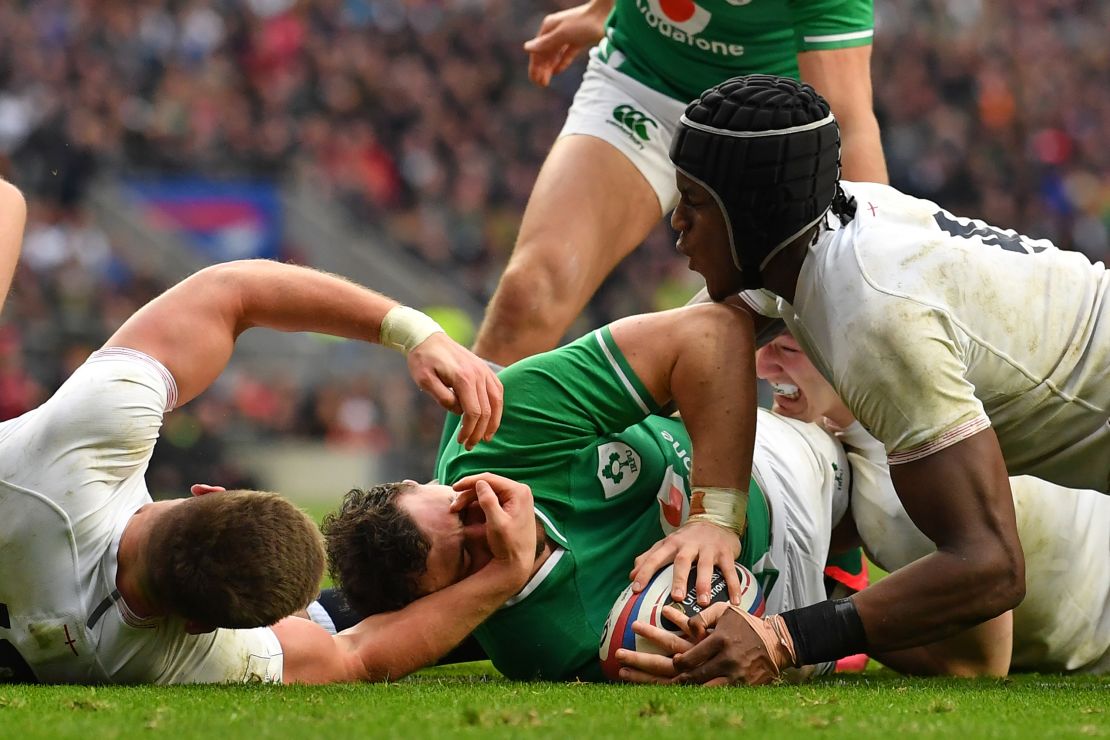 Ireland's centre Robbie Henshaw gets the ball down to score his side's first try in the 24-12 defeat to England.