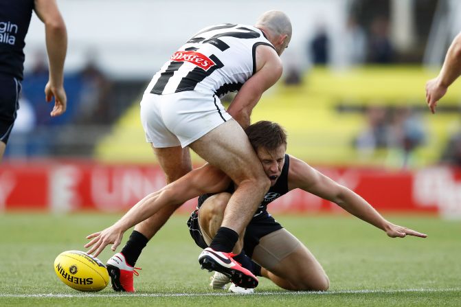 Matthew Owies of the Blues and Steele Sidebottom of the Magpies contest the ball during an AFL practice rugby match at Ikon Park in Melbourne, Australia on February 20.