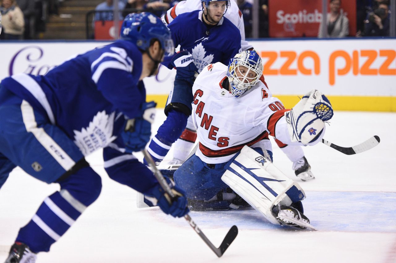 Carolina Hurricanes emergency goalie David Ayres defends against the Toronto Maple Leafs in Toronto on February 22. The Hurricanes won 6-3 and at 42 years and 194 days, Ayres became the <a href="https://www.cnn.com/2020/02/23/sport/dave-ayres-nhl-debut/index.html" target="_blank">oldest goaltender in league history</a> to win his regular-season debut. Ayres, who needed a kidney transplant and had two bouts of skin cancer, is a Zamboni driver for the Toronto Marlies of the American Hockey League.