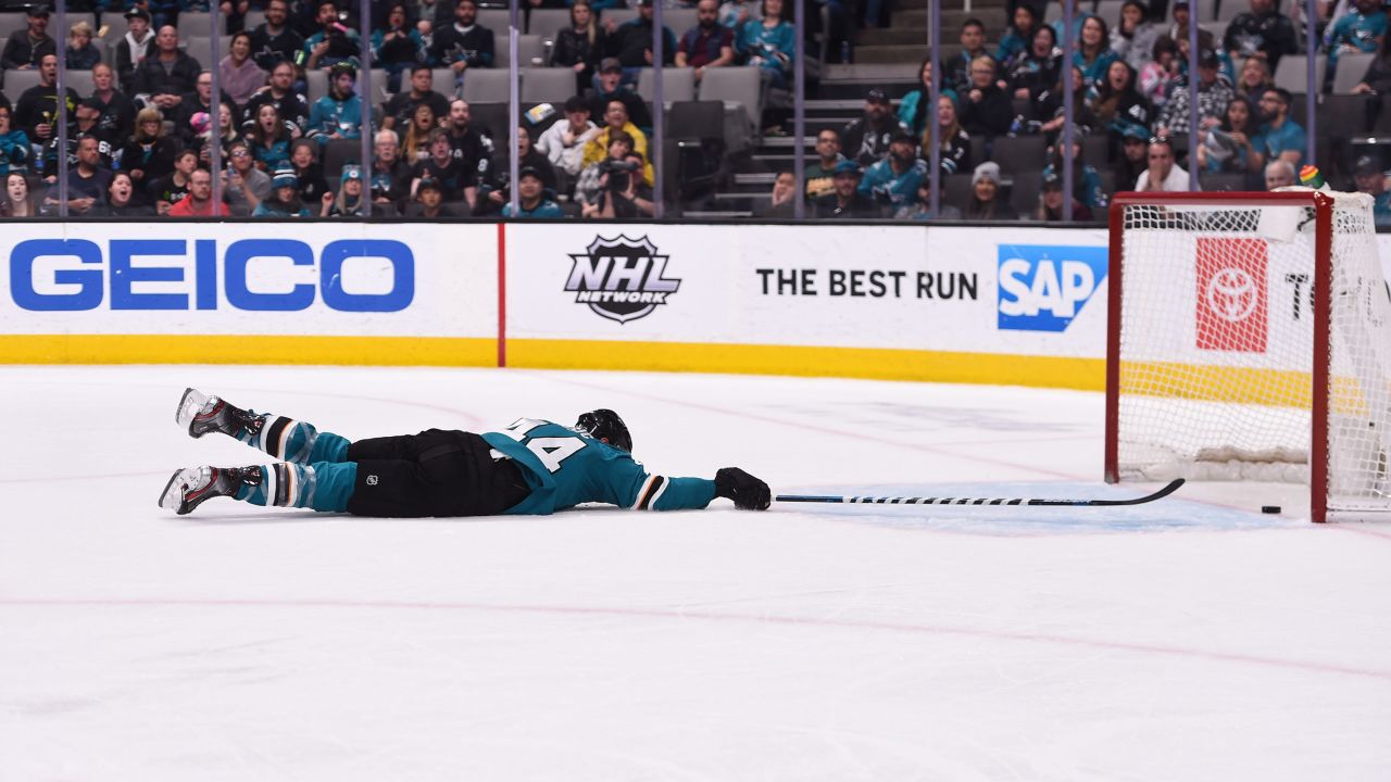 San Jose Sharks defenseman Marc-Edouard Vlasic dives after the puck as the Florida Panthers score during the third period in San Jose, California, on February 17. The Panthers won 5-3.