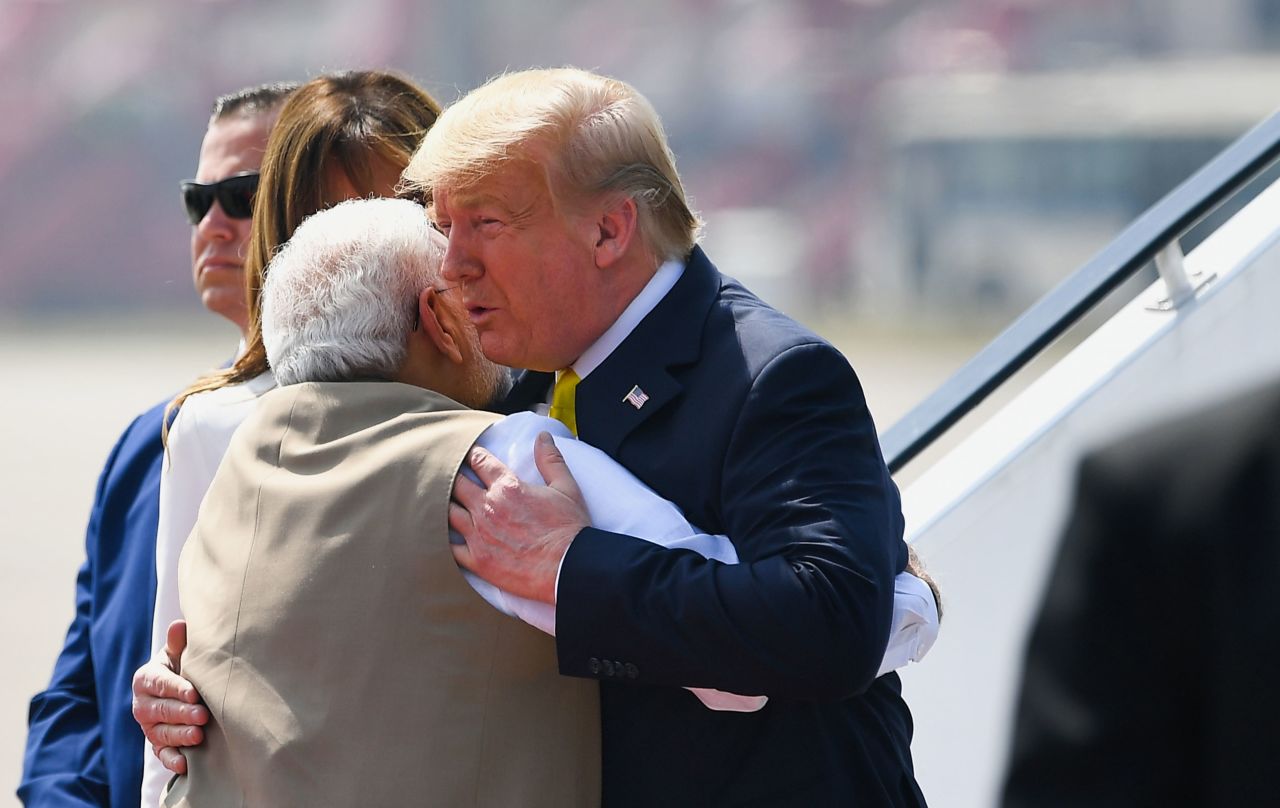 Modi embraces Trump upon his arrival.