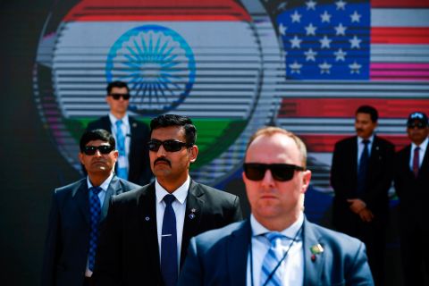 Members of the US Secret Service and the Indian Special Protection Group stand guard during the rally.