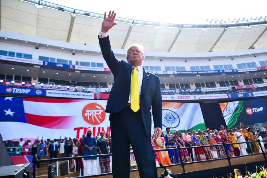 Trump waves after attending a rally at a cricket stadium in Ahmedabad, India.
