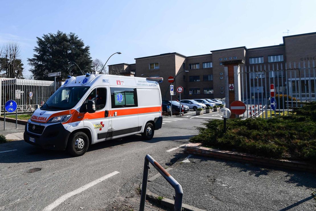 An ambulance leaves the municipal hospital in Codogno, southeast of Milan, on February 22, 2020.