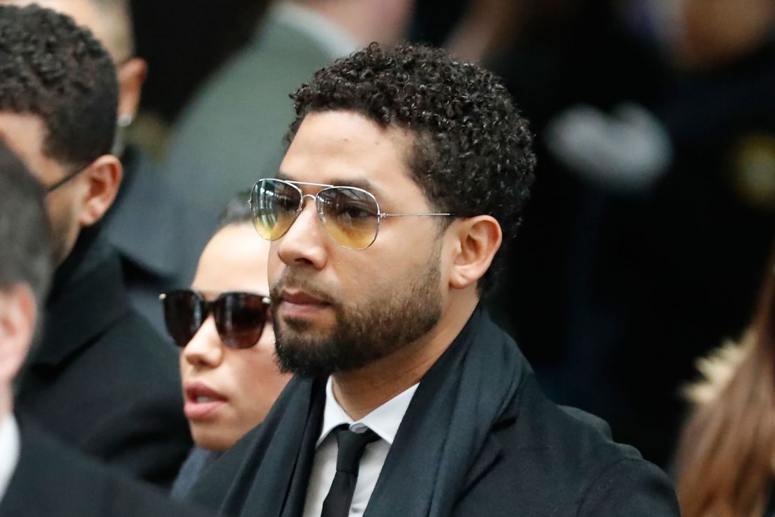 Smollett arrives at a Chicago courthouse Monday, almost a year after his last appearance.