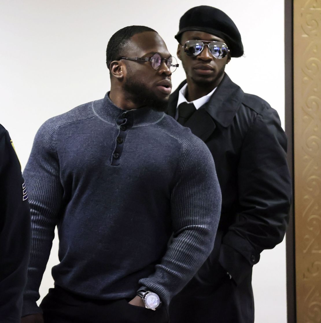 Abimbola Osundairo (left) and Olabinjo Osundairo arrive at the Leighton Criminal Courthouse.