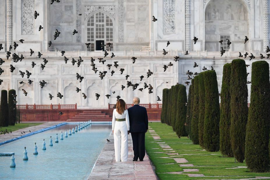 The Trumps tour the grounds of the Taj Mahal.