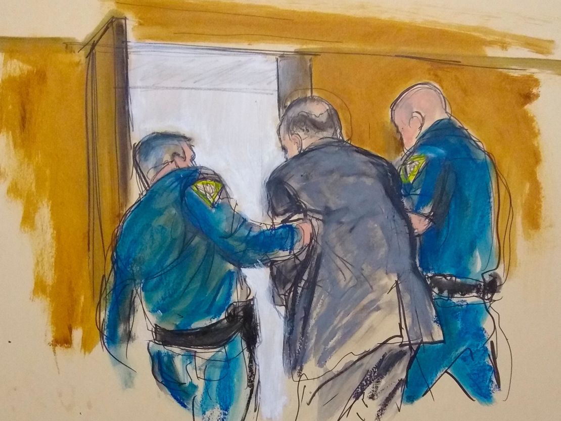 In this courtroom sketch, Harvey Weinstein, is led out of Manhattan Supreme Court by court officers after after a jury convicted him of rape and sexual assault, Monday, February 24, 2020 in New York. 