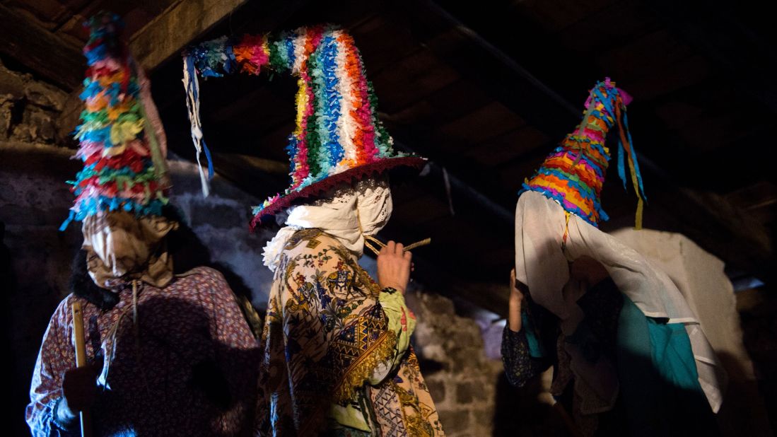 <strong>Lantz, Spain:</strong> Revelers dressed as Txatxoak characters get ready to take part in an ancient Carnival tradition in the village in northern Spain.