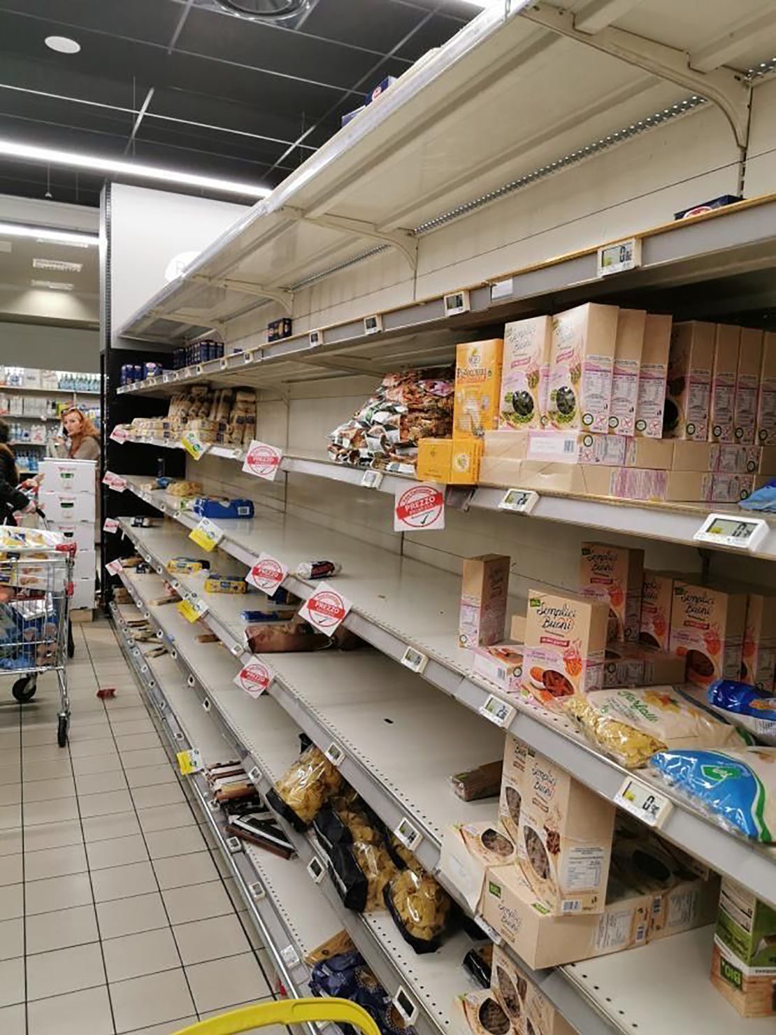 A half-empty supermarket shelf in Milan. 