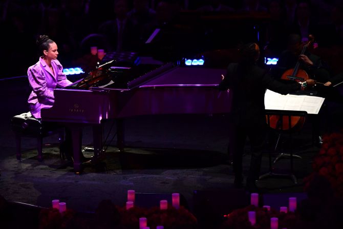 Alicia Keys performs at the memorial service.