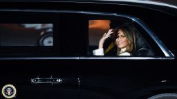 US First Lady Melania Trump waves sitting next to President Donald as they leave Palam Air Force Base in New Delhi on February 24, 2020. (Photo by Prakash SINGH / AFP) (Photo by PRAKASH SINGH/AFP via Getty Images)
