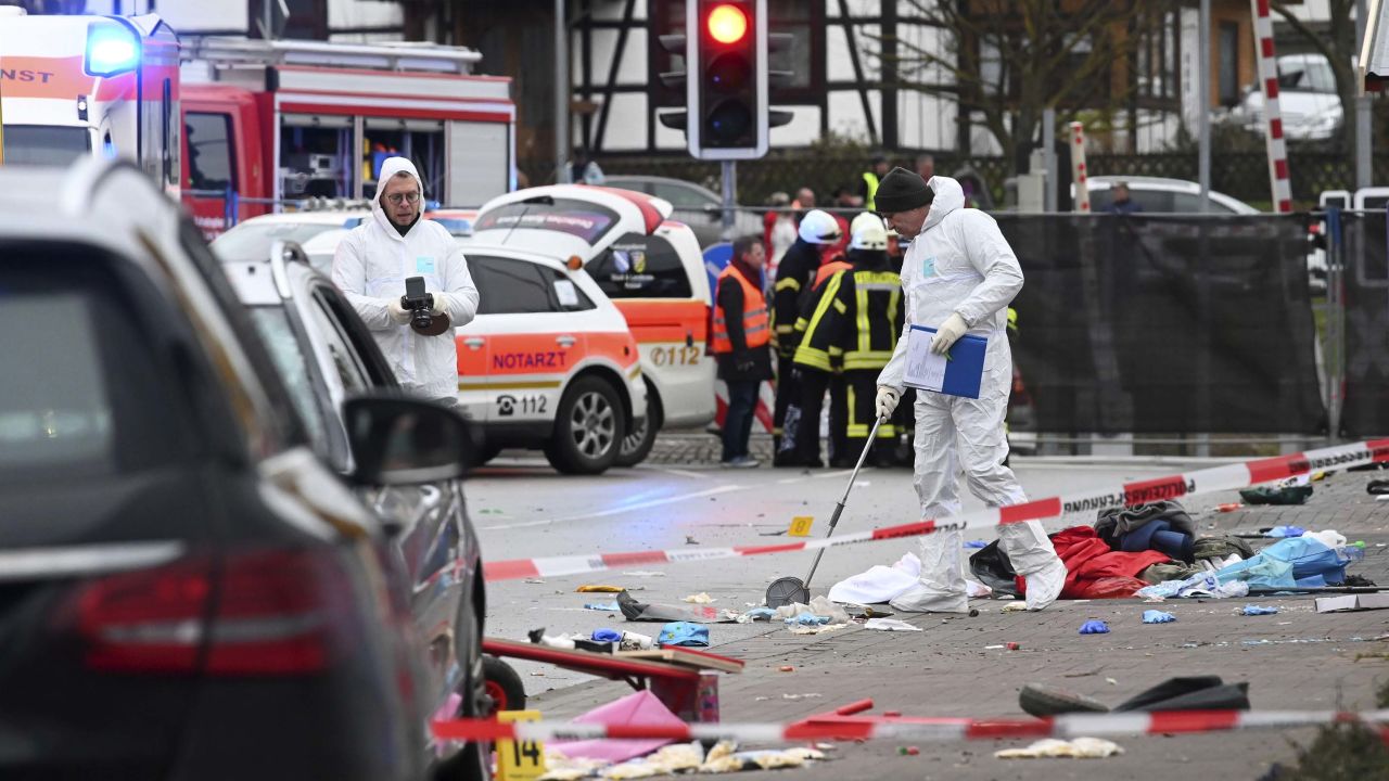 Police and rescue workers at the scene of the incident at Volkmarsen's Rose Monday parade.