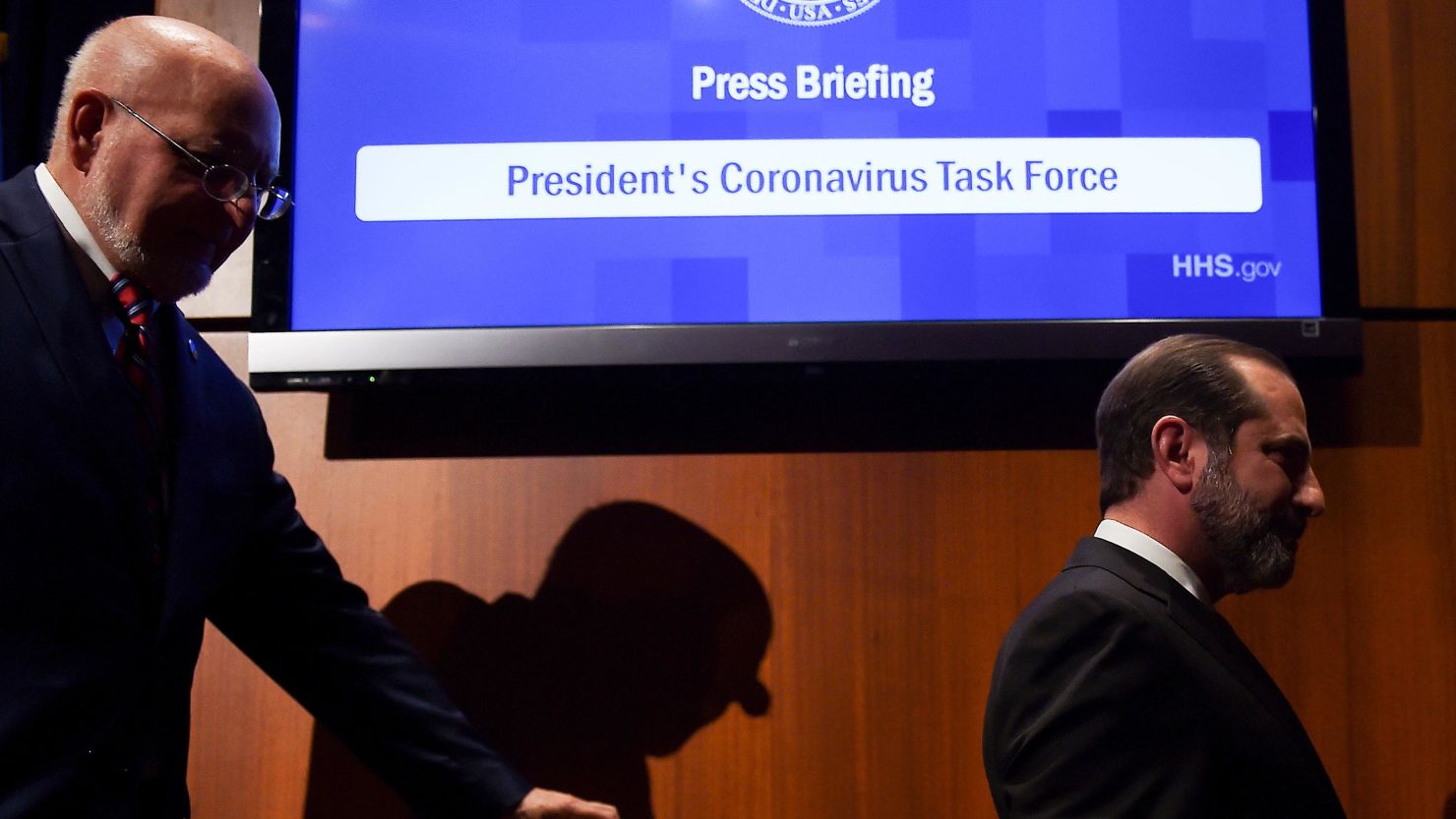 Health and Human Services Secretary Alex Azar (L) and Centers for Disease Control and Prevention (CDC) Director Robert Redfield leave after a press conference on the coordinated public health response to the 2019 coronavirus (2019-nCoV) on February 7, 2020 in Washington, DC.