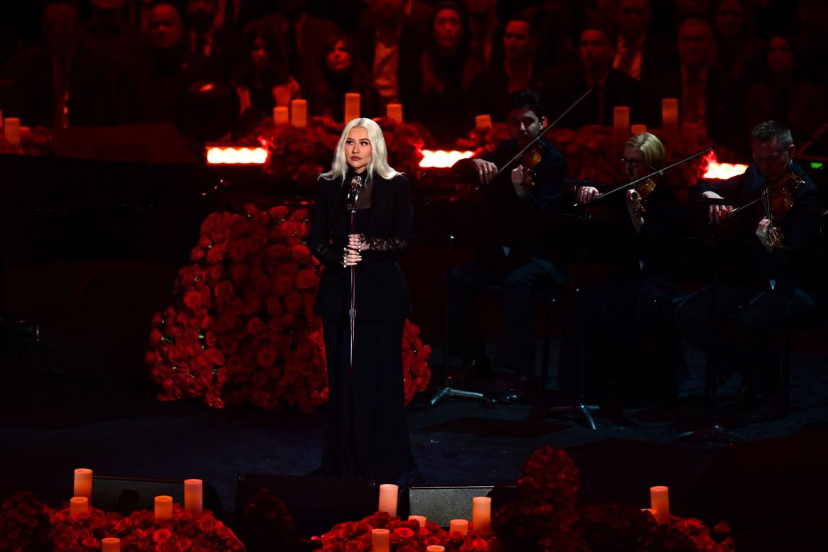 Christina Aguilera performs at the celebration of life memorial service.