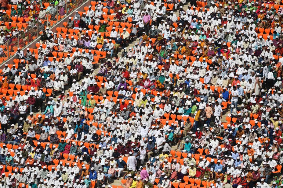 People listen to Trump's speech during Monday's rally.