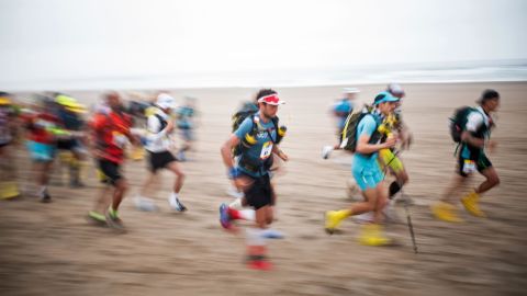 Competitors take part in the second stage of the 2nd Half Marathon Des Sables Ica Desert-Peru, in Paracas, Peru, on December 3, 2019.