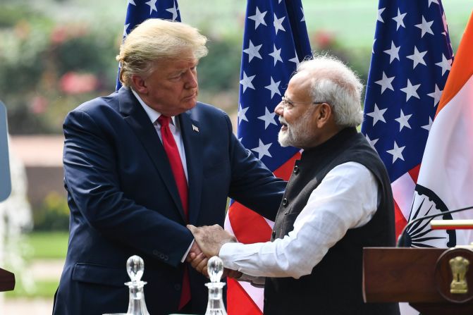 Trump shakes hands with Modi during a news conference in New Delhi on Tuesday.