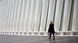 A pedestrian walks past the Oculus transportation hub in New York, U.S., on Tuesday, Feb. 4, 2020. U.S. stocks surged as the rally in risk assets entered a third day on rising bets the coronavirus won't derail the global economy. Photographer: Michael Nagle/Bloomberg via Getty Images