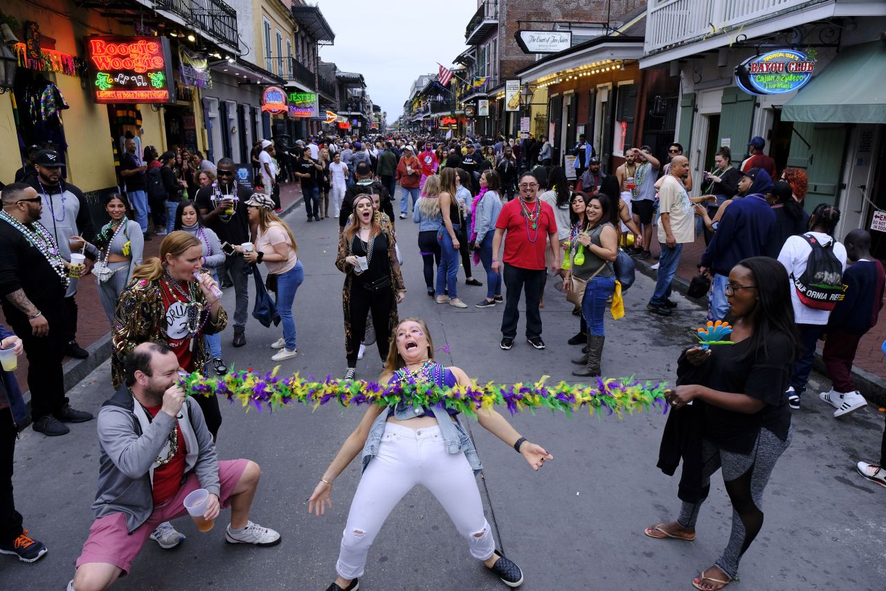 People party on Bourbon Street during Mardi Gras celebrations on Tuesday.