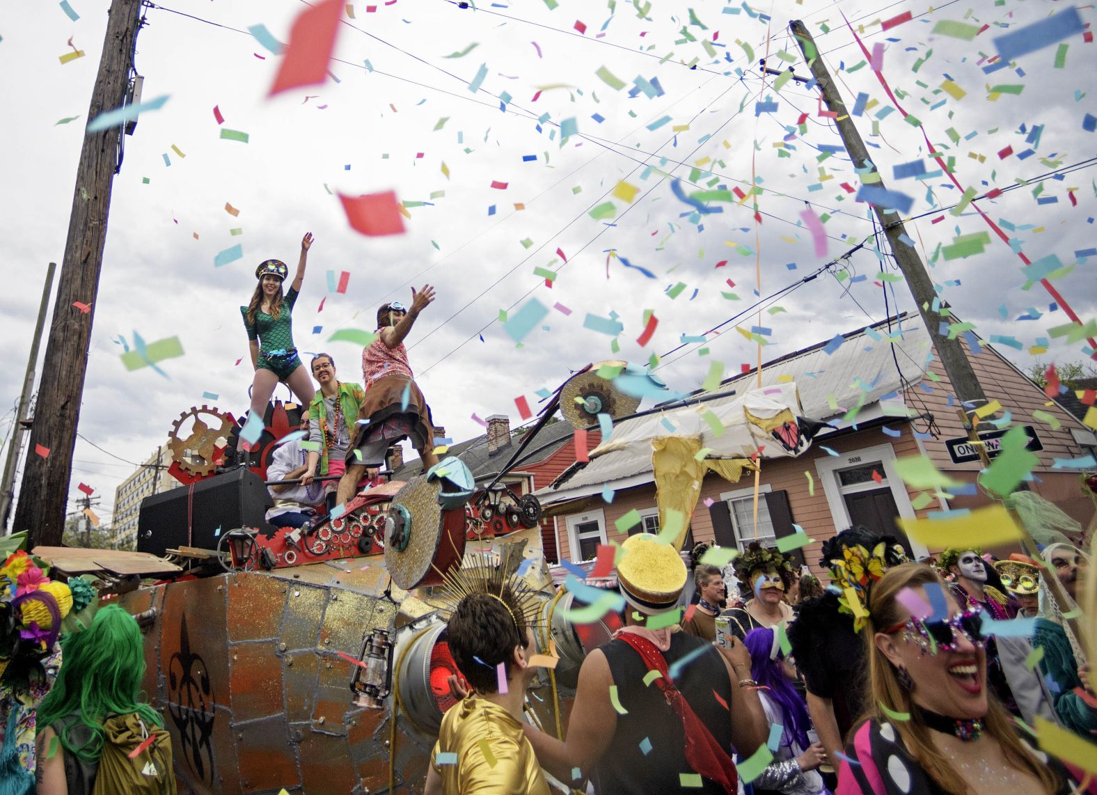 People march in the St. Anne parade through the Marigny on Tuesday.