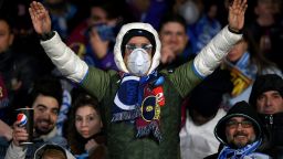NAPLES, ITALY - FEBRUARY 25: SSC Napoli supporter with a mask due to Coronavirus before the UEFA Champions League round of 16 first leg match between SSC Napoli and FC Barcelona at Stadio San Paolo on February 25, 2020 in Naples, Italy. (Photo by Francesco Pecoraro/Getty Images)