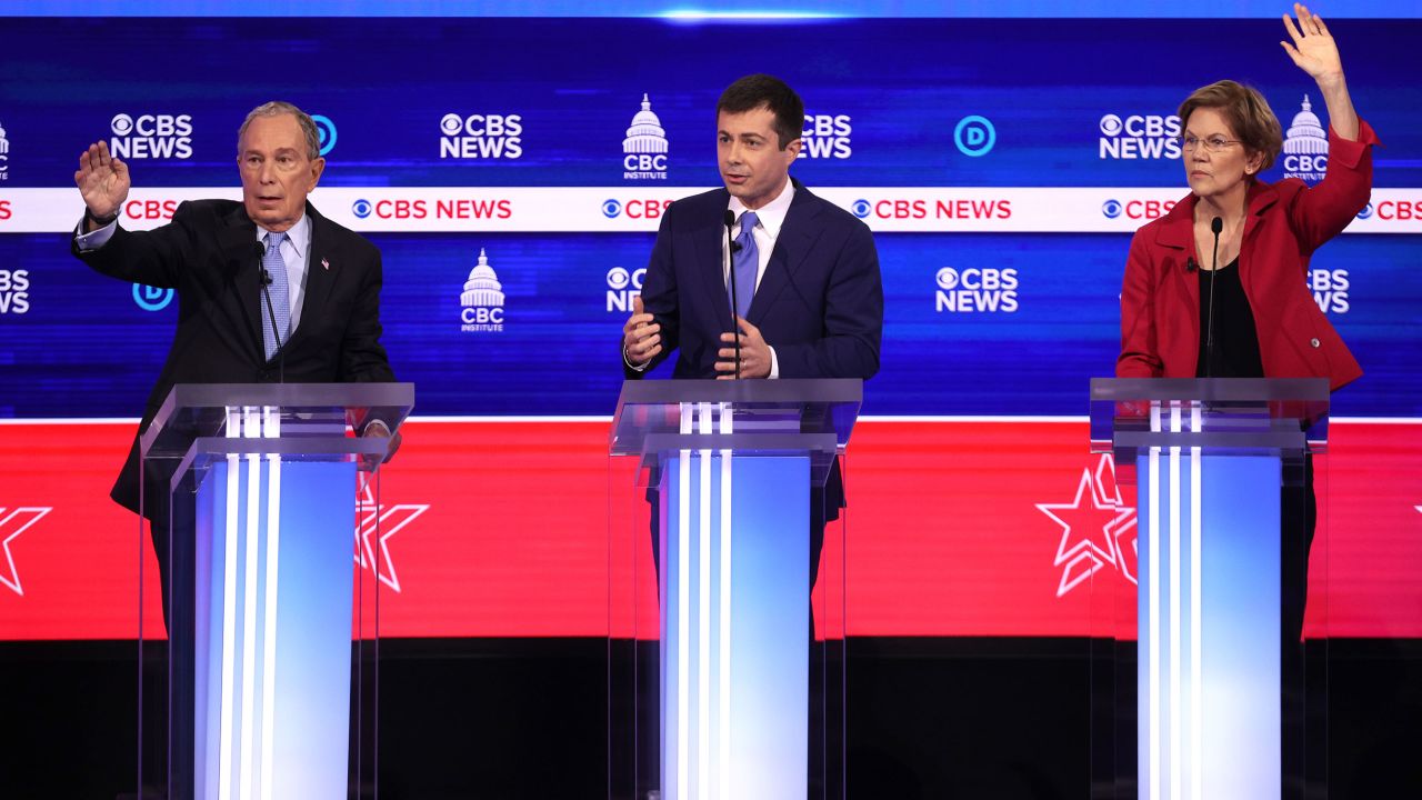 Democratic presidential candidate former South Bend, Indiana Mayor Pete Buttigieg speaks as former New York City Mayor Mike Bloomberg (L)
and Sen. Elizabeth Warren (D-MA) (R) looks on during the Democratic presidential primary debate at the Charleston Gaillard Center on February 25, 2020 in Charleston, South Carolina.