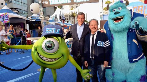Iger and actor Billy Crystal attend the world premiere of the Pixar film "Monsters University" at the El Capitan Theatre in Hollywood in 2013.
