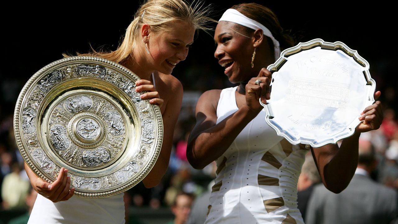 Sharapova poses with Serena Williams after the 2004 Wimbledon final.