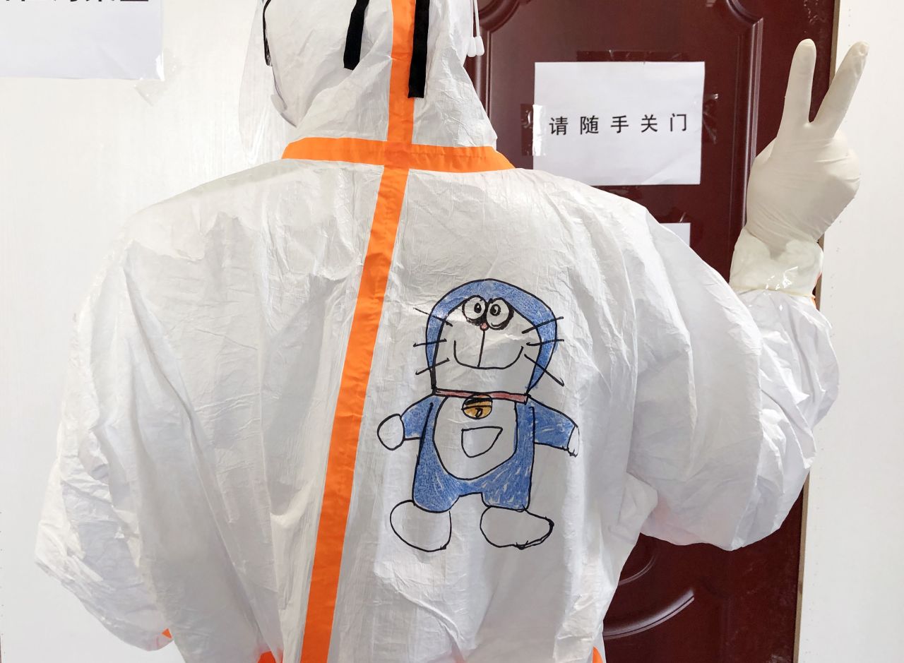 A medical staff member in the Wuhan Children's Hospital in Wuhan, China -- the epicenter of the coronavirus outbreak. At the isolation ward of infected children, many young patients were afraid of seeing the medical staff wrapped in protective suits. A nurse in the hospital came up with the idea of drawing cartoons on the protective suits and inviting children to color them, to make them feel more at ease.