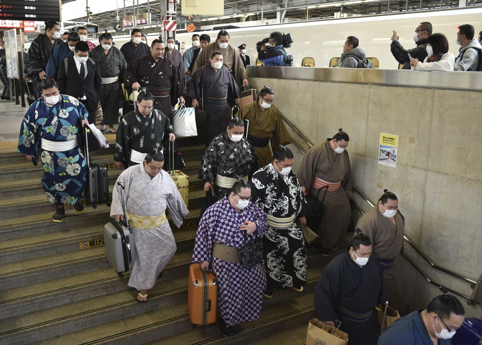 Sumo wrestlers in Osaka, Japan, on February 23. The Osaka Grand Sumo Tournament will start on March 8. But many other sporting events and major public gatherings have been canceled across Asia as the coronavirus spreads. There was speculation that the Tokyo 2020 Olympic Games could be canceled as well -- but organizers told CNN preparations for the Games were continuing as planned.