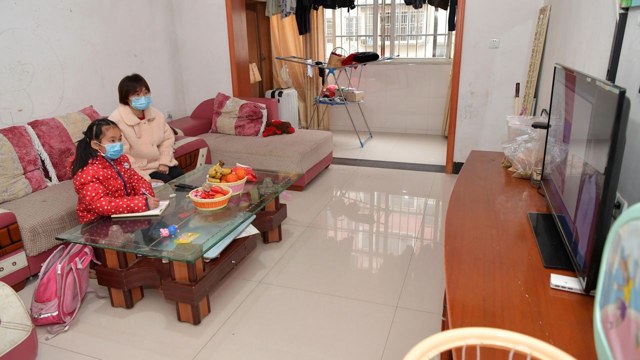 A student attends an online class at home in Nanchang City, in east China's Jiangxi Province, February 10, 2020. 