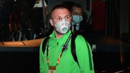 Ludogorets' Romanian defender Cosmin Iosif Moti wears a face mask as a safety measure against the COVID-19, the novel coronavirus, as he boards the bus on the way to compete in the UEFA Europa League round of 32 second-leg football match between Inter Milan and Ludogorets Razgrad on February 27, 2020, in Milan. (Photo by Miguel MEDINA / AFP) (Photo by MIGUEL MEDINA/AFP via Getty Images)