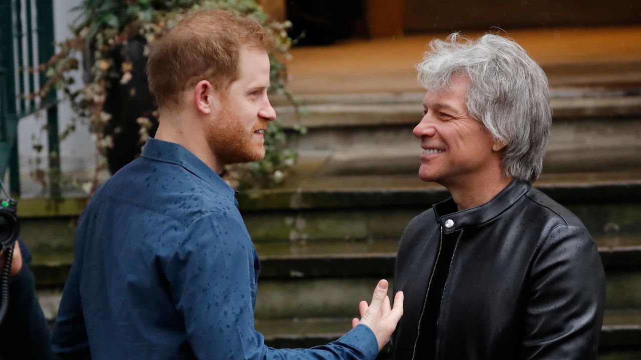 Prince Harry chats with singer Jon Bon Jovi at Abbey Road Studios in London on Friday, February 28.