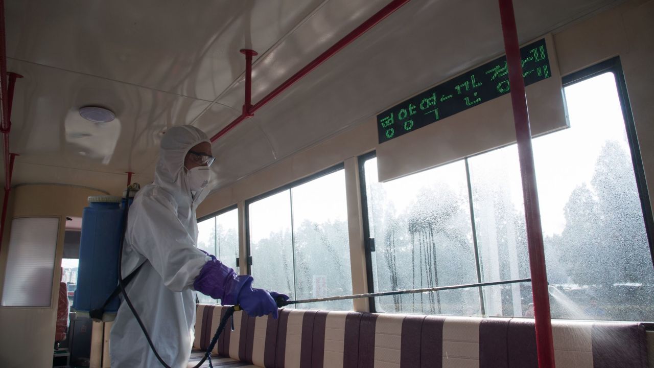 An official from the Mangyongdae District emergency anti-epidemic headquarters disinfects a tramcar to prevent the spread of the novel coronavirus, at the Songsan Tram Station in Pyongyang on February 26, 2020.