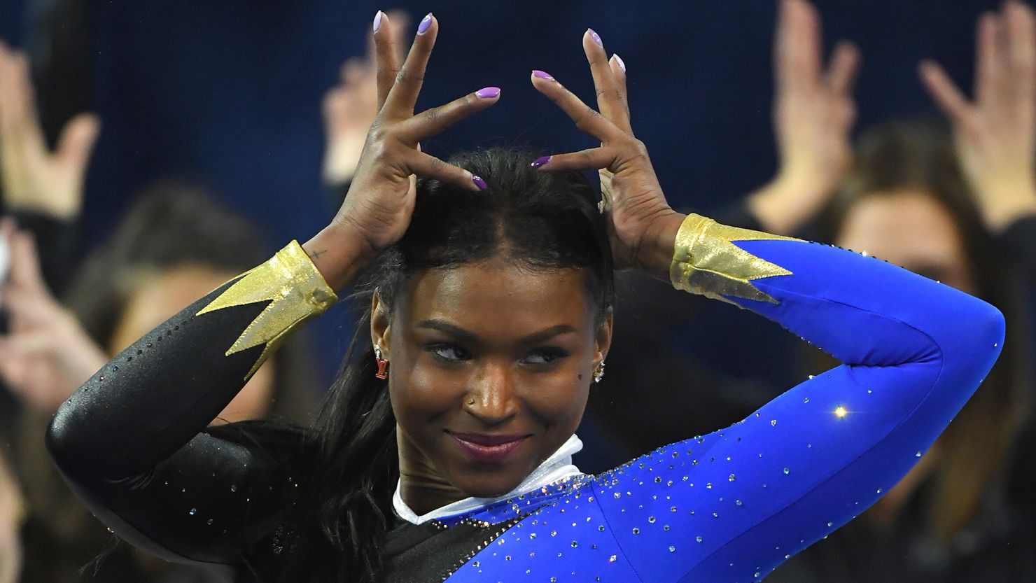 Nia Dennis performs the floor exercise during UCLA Gymnastics Meet the Bruins intra squad event at Pauley Pavilion on December 14, 2019, in Los Angeles, California.