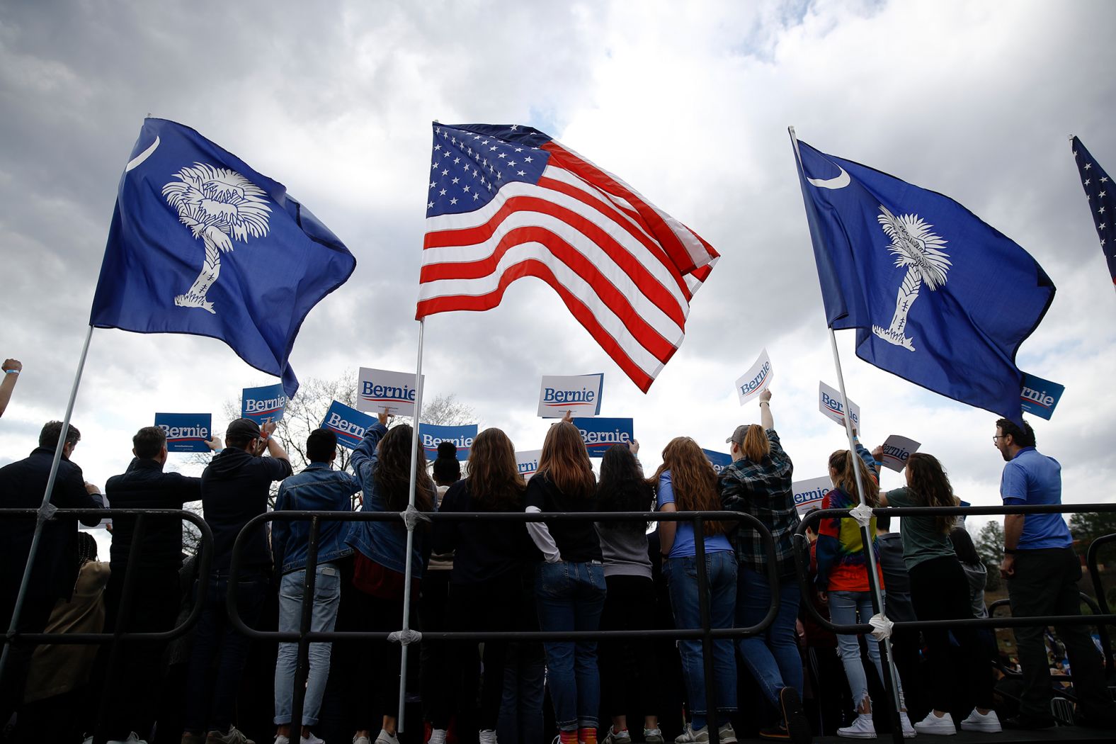 Rallygoers listen to Sanders during a campaign event in Columbia on Friday.