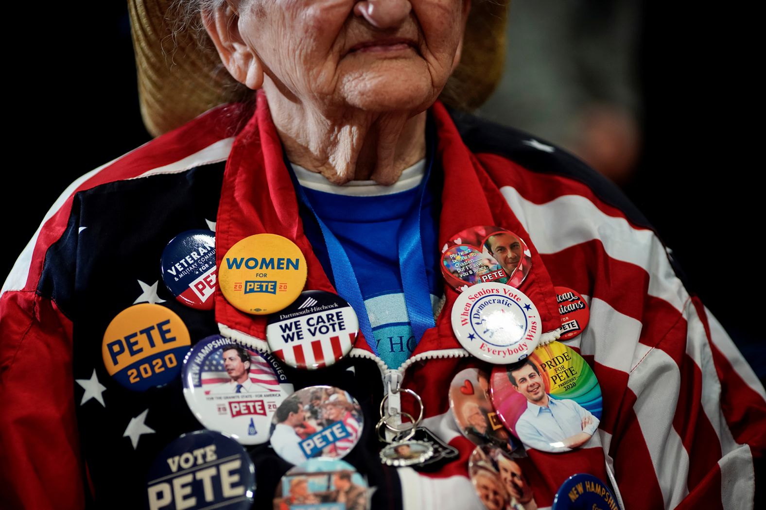 A Buttigieg supporter flaunts buttons during a campaign event in Columbia.