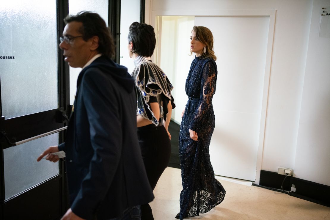 Actress Adèle Haenel (right) leaves the award ceremony after Roman Polanski wins the award for best director.