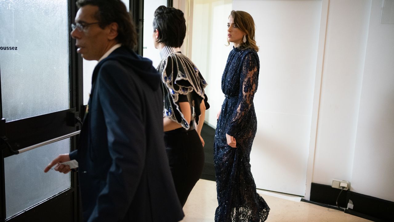 Actress Adèle Haenel (right) leaves the award ceremony after Roman Polanski wins the award for best director.