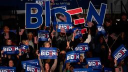 Supporters cheer as the polls close for Democratic presidential candidate Joe Biden at his primary night event in Columbia, South Carolina, on February 29, 2020. (Photo by JIM WATSON / AFP) (Photo by JIM WATSON/AFP via Getty Images)