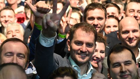 Leader of Slovakia's OLaNO party, Igor Matovic (center), celebrates after winning Saturday's election. 
