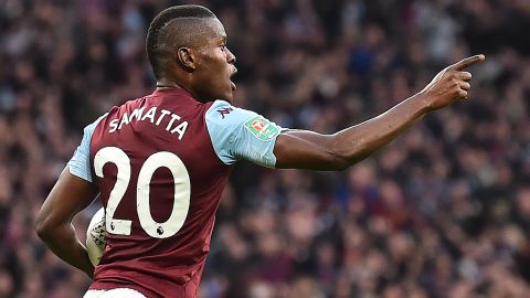 Samatta celebrates scoring in the League Cup final against Manchester City.