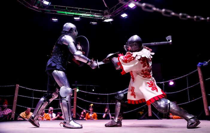 Participants dressed in historical armor fight during the WMFC Medieval fighting championship in Moscow, Russia, on February 23.