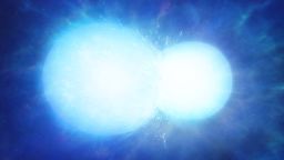 Artist's impression of two white dwarfs in the process of merging. Depending on the combined mass, the system may explode in a thermonuclear supernova, or coalesce into a single heavy white dwarf, as with WDJ0551+4135.