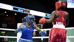 Kenya's Christine Ongare (Blue) fights against Uganda's Catherine Nanziri (Red) during the women's Fly finals at the Dakar arena on February 29, 2020 in Dakar, Senegal. 