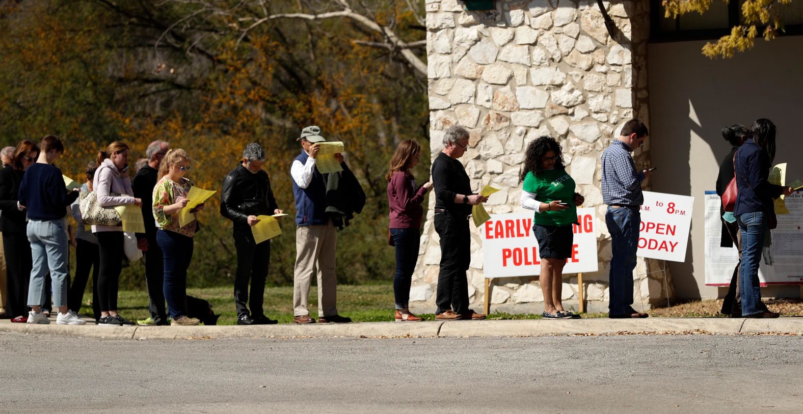 People in San Antonio wait in line for early voting on Friday.