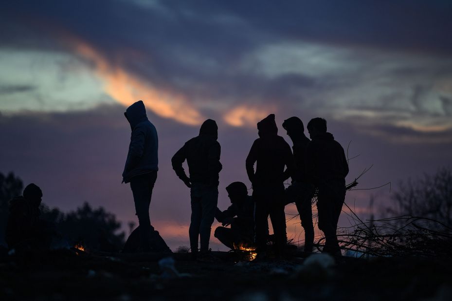 Migrants wait to attempt a crossing of the Maritsa river, near Edirne, Turkey, on March 2.