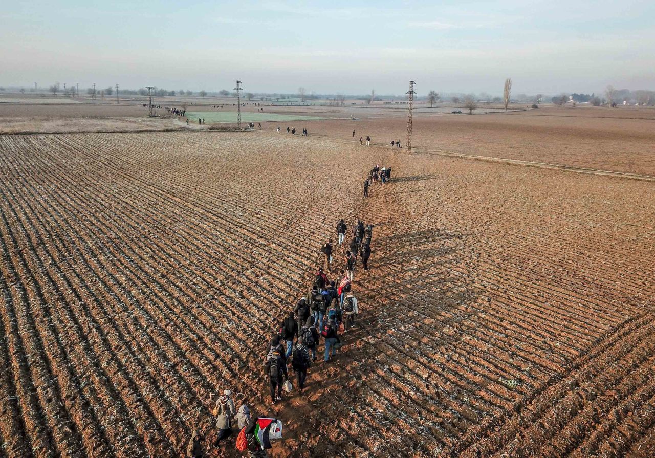 Migrants walk toward the Greek border near Pazarkule, Turkey, on March 1.