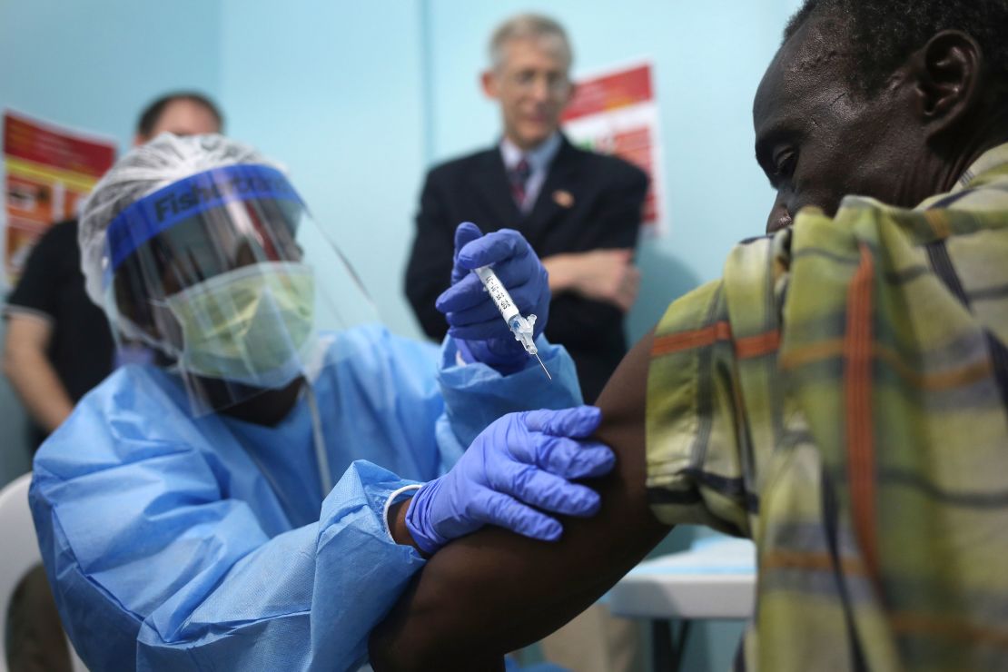 A nurse administers an injection on the first day of the Ebola vaccine study being conducted at Redemption Hospital.